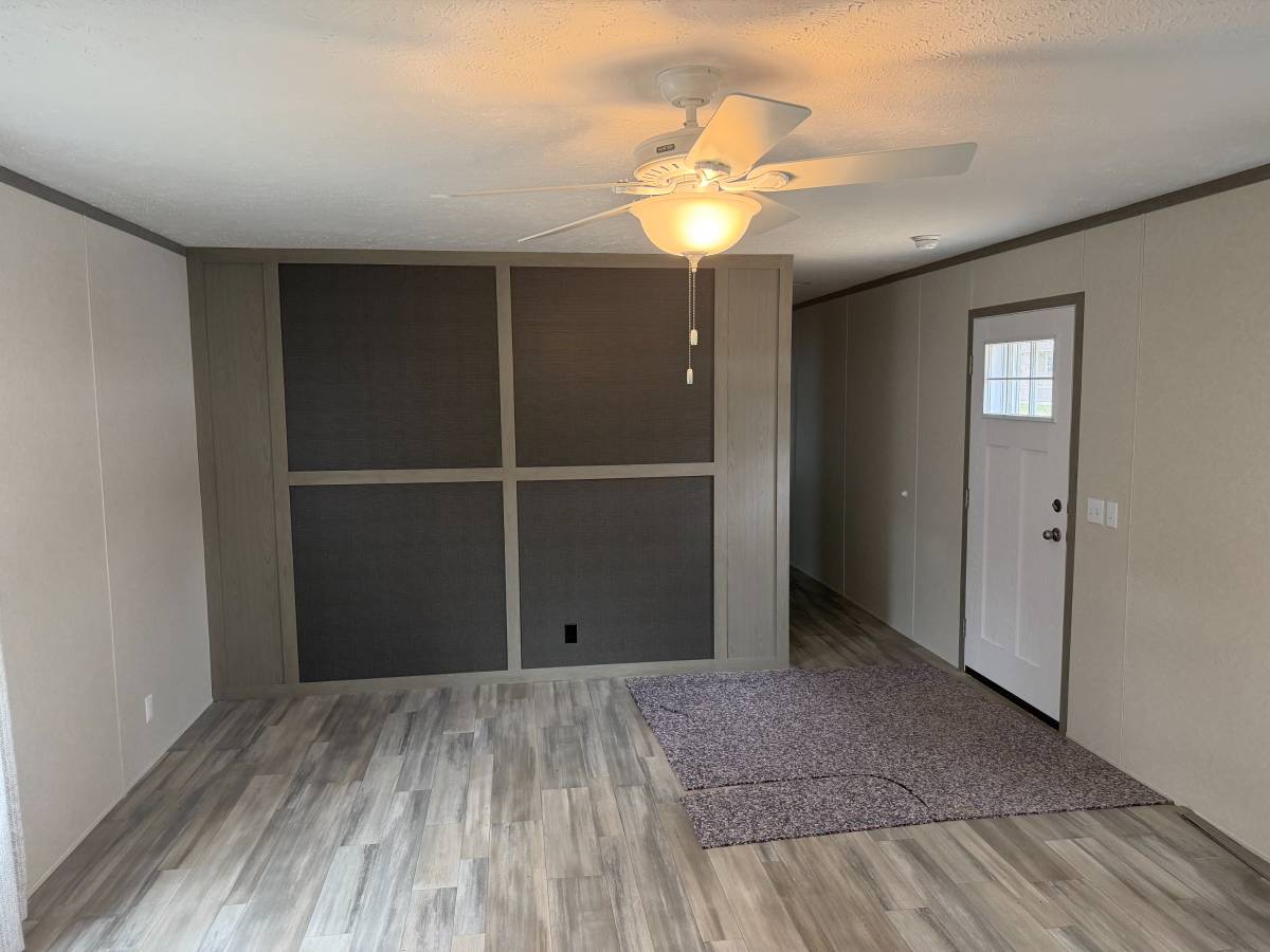 Brand new Manufactured House in a clean, safe, quiet park with large wooded lots.
